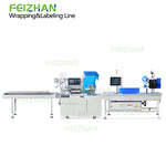 automatic flow wrapper with weighing system