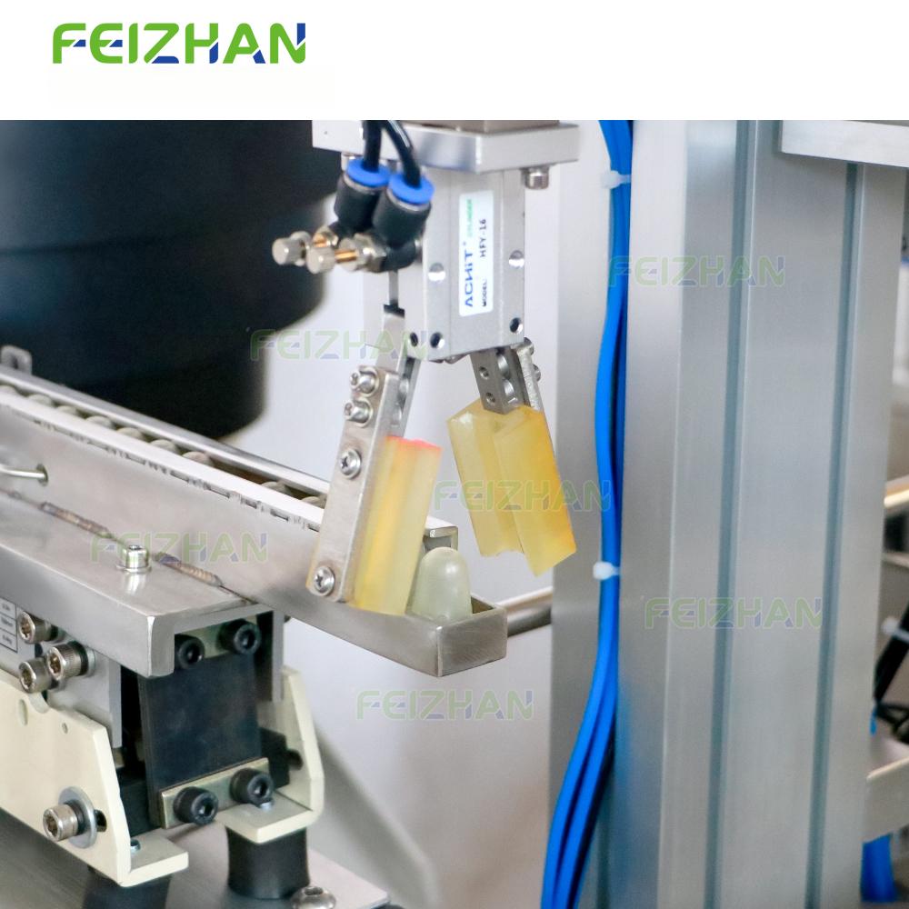 cap feeding system of pointed bottle filling machine