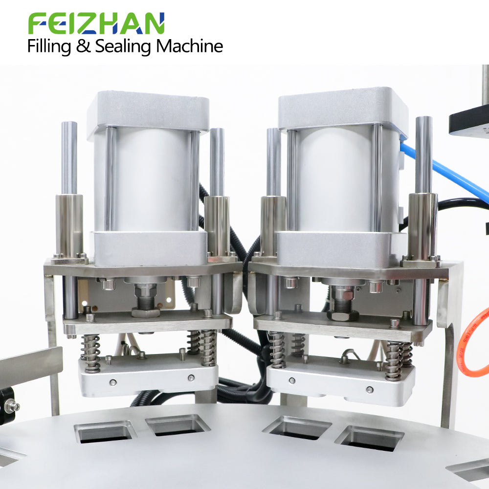 sealing system of automatic cup filling and sealing machine