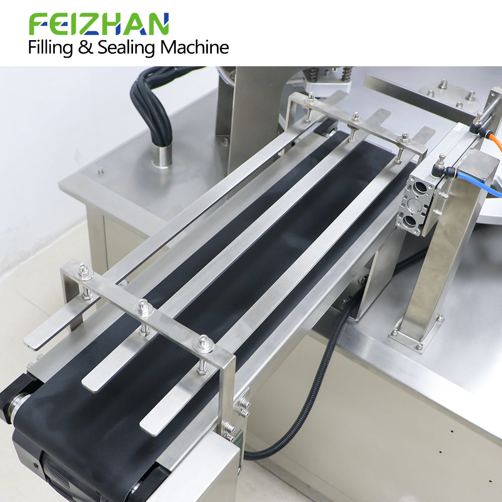 finished product outlet of food cup filling sealing machine for jelly