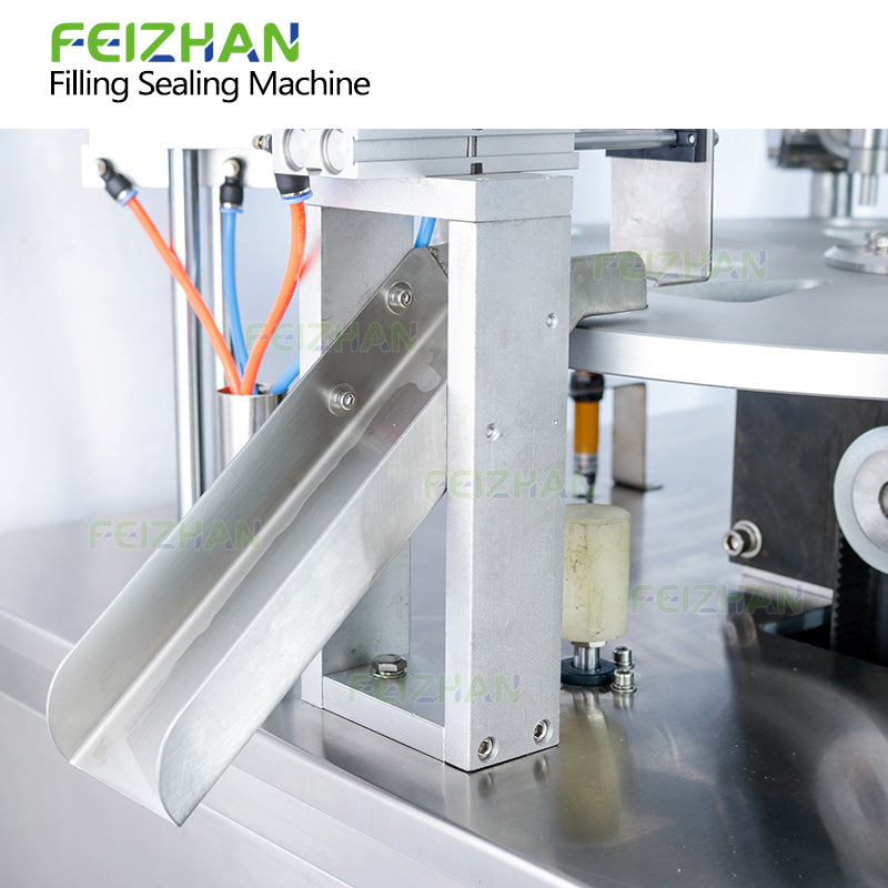 products outfeed of automatic yogurt cup filling sealing machine